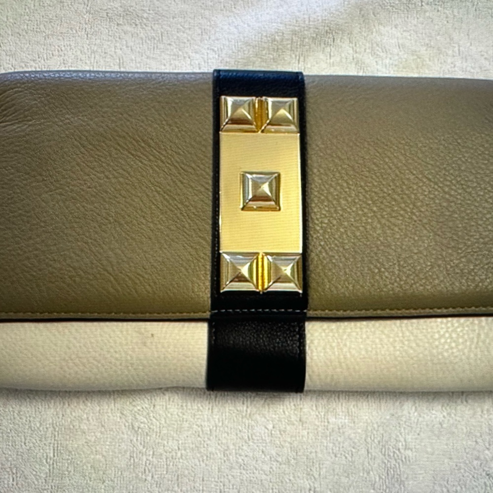 Vince Camuto leather clutch bag ( Like New )
